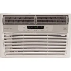 First-time buyer comparing two portable heaters in a bright living room