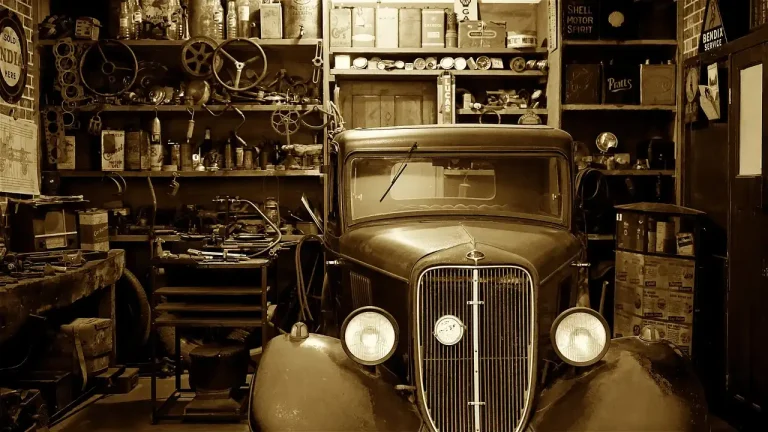 Garage heater mounted in a real garage with shelves, insulation, and daylight from the open door