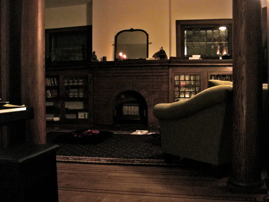 Renter using a compact ceramic space heater in a small apartment living room